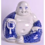 A CHINESE REPUBLICAN PERIOD BLUE AND WHITE BUDDHA modelled holding prayer beads in foliate