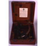 A MAHOGANY CASED SEXTANT BY H HUGHES & SONS OF LONDON. 9Ins wide.