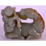 A 19TH CENTURY CHINESE CARVED GREEN JADE MODEL OF A HORSE depicted with a young child upon its back.