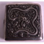 A LATE 19TH CENTURY JAPANESE MEIJI PERIOD SILVER CIGARETTE CASE decorated with dragons and