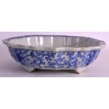 AN EARLY 19TH CENTURY CHINSE BLUE AND WHITE BARBED BOWL in the Ming style, painted with stylised