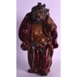 AN EARLY 20TH CENTURY CHINESE FLAMBE GLAZED POTTERY FIGURE signed Shi Lin, depicting a bearded