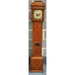 AN EARLY 20TH CENTURY WALNUT MARQUETRY GRAND MOTHER CLOCK with pierced silver dial, the case