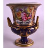 AN EARLY 19TH CENTURY DERBY TWIN HANDLED VASE painted with flowers. 7Ins high.