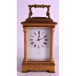 A LARGE 19TH CENTURY FRENCH BRASS CARRIAGE CLOCK the dial signed E White Paris, 32 Haymarket London,