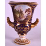 AN EARLY 19TH CENTURY DERBY TWIN HANDLED VASE painted with Dovedale  in Derbyshire. 7.25ins high.