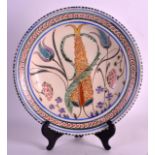 AN EARLY 20TH CENTURY HONITON POTTERY CHARGER possibly a prototype, purchased directly from the