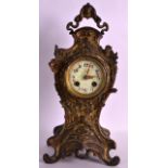 A LATE 19TH CENTURY FRENCH BRONZE MANTEL CLOCK with rococo style case, the dial painted with