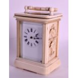 A SMALL 19TH CENTURY FRENCH IVORY CARRIAGE CLOCK of miniature proportions, carved with foliage and a