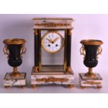 A 19TH CENTURY FRENCH EMPIRE STYLE FOUR GLASS REGULATOR CLOCK with matching side urns. Clock 1ft