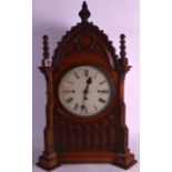 A LARGE VICTORIAN CARVED OAK GOTHIC REVIVAL BRACKET CLOCK of architectural form, cream painted