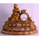 A 19TH CENTURY FRENCH ORMOLU MANTEL CLOCK inset with Sevres porcelain panels, surmounted as a female