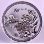 A CHINESE REPUBLICAN PERIOD PORCELAIN DISH enamelled with a snowy landscape. 9Ins diameter.