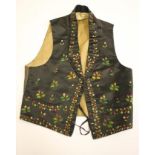 A GENTLEMAN'S BLACK SILK SATIN WAISTCOAT, c.1800, with plain collar, two self bound slit pockets and