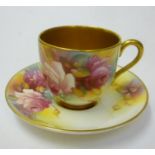 A ROYAL WORCESTER PORCELAIN MINIATURE TEACUP AND SAUCER, c.1950, painted in colours by M. Hunt