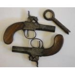 A PAIR OF PERCUSSION MUFF PISTOLS, 19th century, with 1 3/8" barrels, acanthus scroll action,