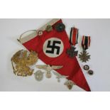 A COLLECTION OF GERMAN FIRST AND SECOND WORLD WAR MEMORABILIA, comprising a Third Reich Iron