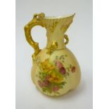 A ROYAL WORCESTER PORCELAIN CORAL TWIG HANDLED JUG, c.1908, of lobed ovoid form painted in colours