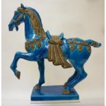 A CHINESE EARTHENWARE "TANG DYNASTY" STYLE HORSE, 20th century, in a turquoise glaze, unmarked, 16