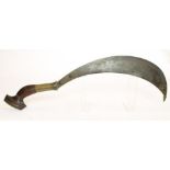 A MALABAR CEREMONIAL AXE, 19th century, the 12 1/4" heavy sickle blade sharp to its inside edge with