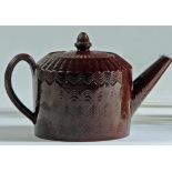 A STAFFORDSHIRE GLAZED RED-WARE TEAPOT AND COVER, c.1760, of plain cylindrical form with strap