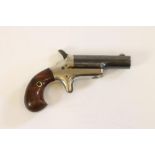 A .41 CALIBRE COLT RIMFIRE PISTOL, c.1871, with 2 1/2" blued barrel signed "COLT", nickel plated