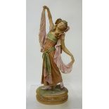 A ROYAL DUX BISQUE PORCELAIN FIGURE, early 20th century, modelled as a young lady wearing an
