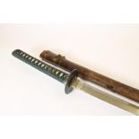 A JAPANESE WWII OFFICER'S KATANA, the 24 1/2" single edged Showa blade with midare hamon and