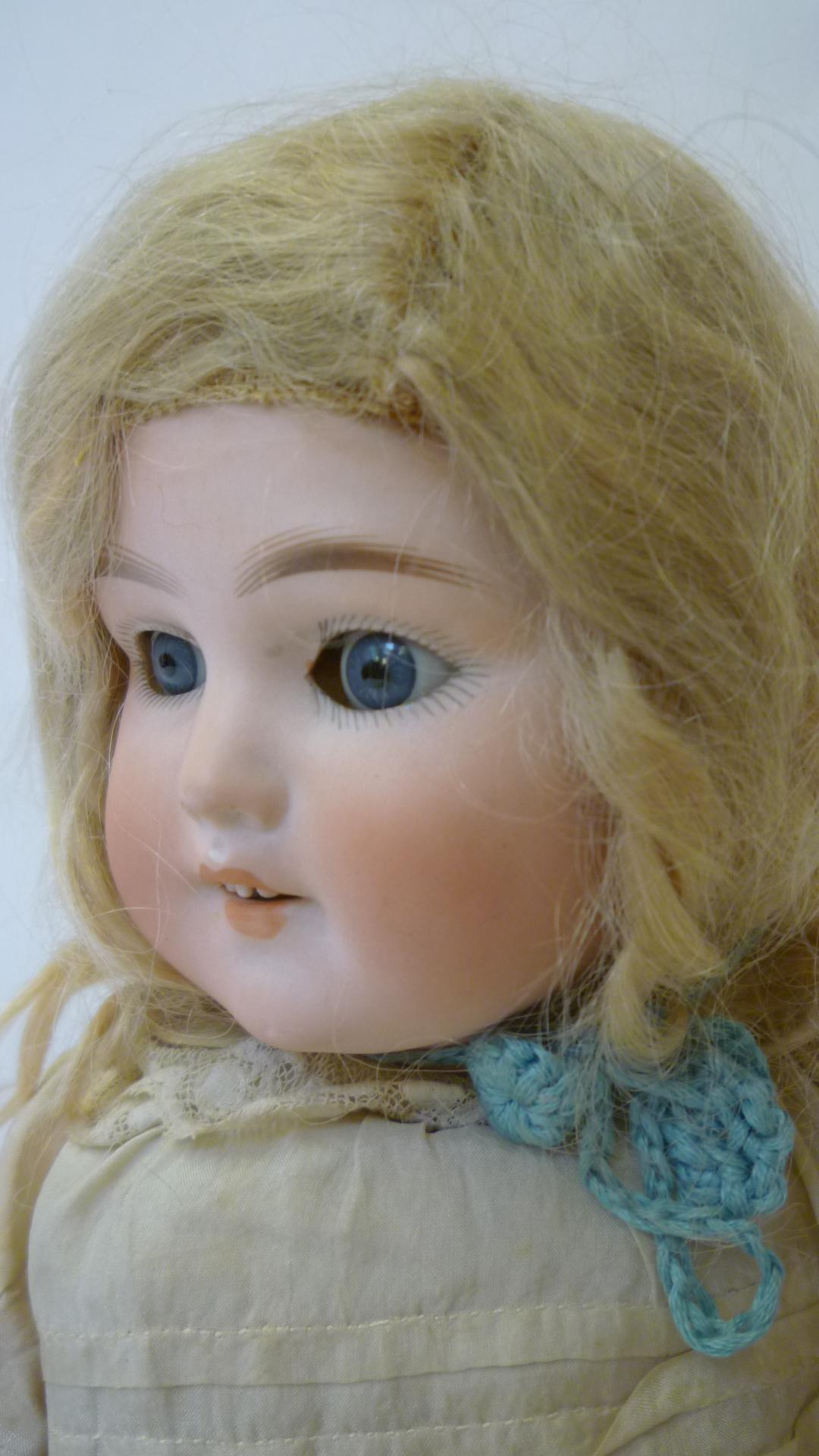 A Schoenau & Hoffmeister bisque head girl doll with blue glass sleeping eyes, open mouth and - Image 2 of 2