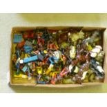 A quantity of lead bandsmen, red Indians, farmyard animals and other items (including Britains), P-