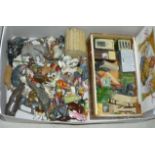 A collection of Britains and other lead zoo animals and farm animals, figures and equipment,