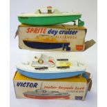 Sutcliffe Boats Victor Motor Torpedo Boat, clockwork, white/pale blue, 10" long, boxed, and a Sprite