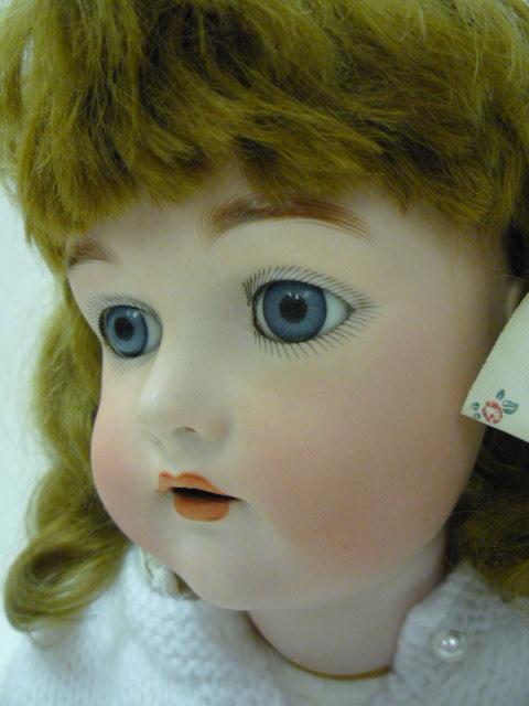 A Kammer & Reinhardt bisque head girl doll with blue glass sleeping eyes, open mouth and teeth, - Image 2 of 2