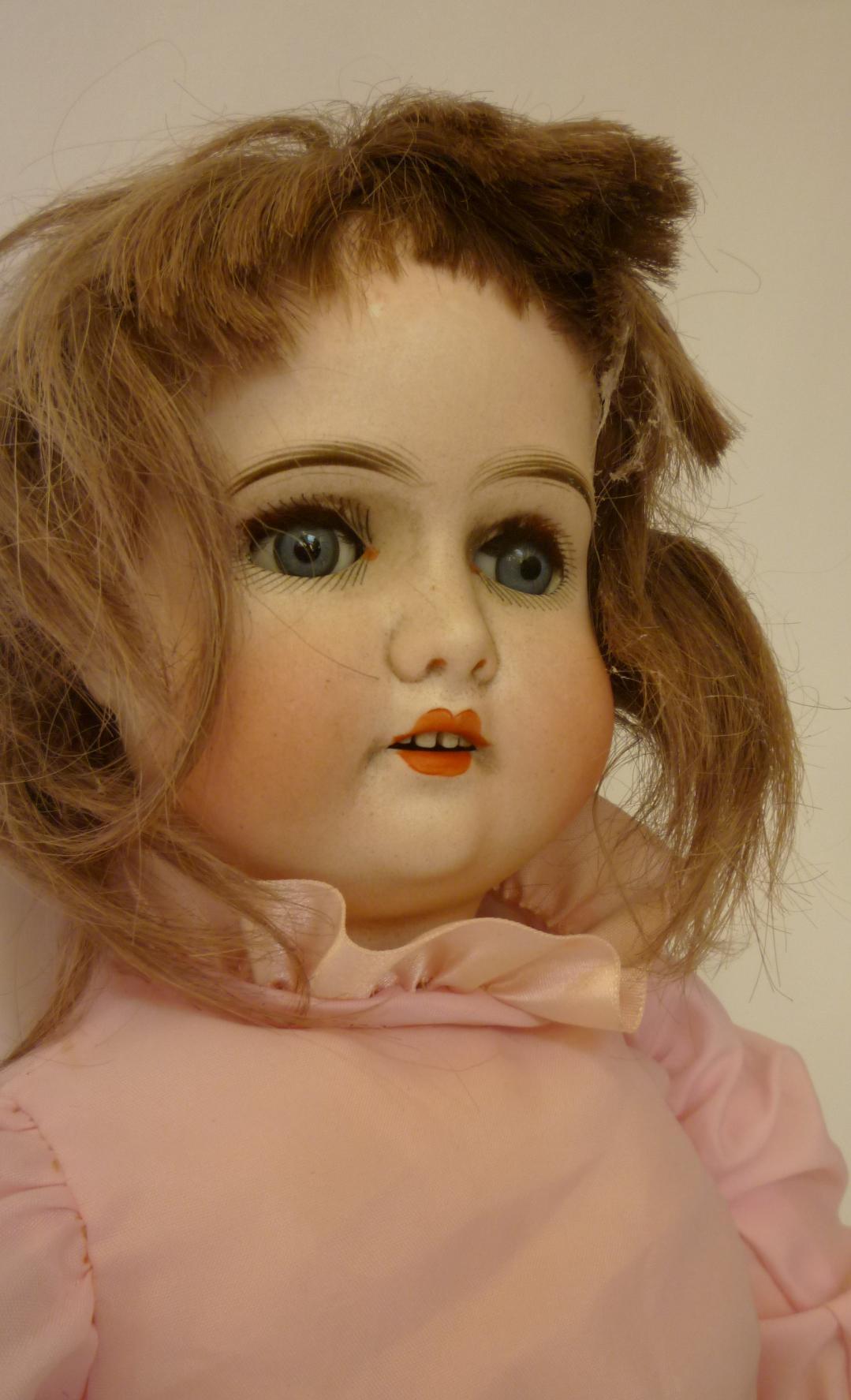 A Gebruder Kuhnlenz bisque head girl doll with blue glass sleeping eyes, open mouth and teeth, brown - Image 2 of 2