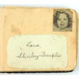 An album containing stuck-in autographs of Shirley Temple (3), Jane Withers (4), Deanna Durbin,