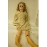 A Schoenhaur & Hoffmeister bisque head girl doll with brown glass sleeping eyes, open mouth and