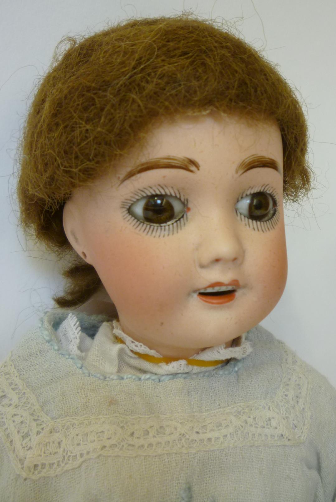 A French "Cherie" bisque head girl doll with fixed brown glass eyes, open mouth and teeth, pierced - Image 2 of 2