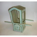 A doll's Sedan chair, painted wood construction, glazed, floral painted panels, 16" high, 17" long