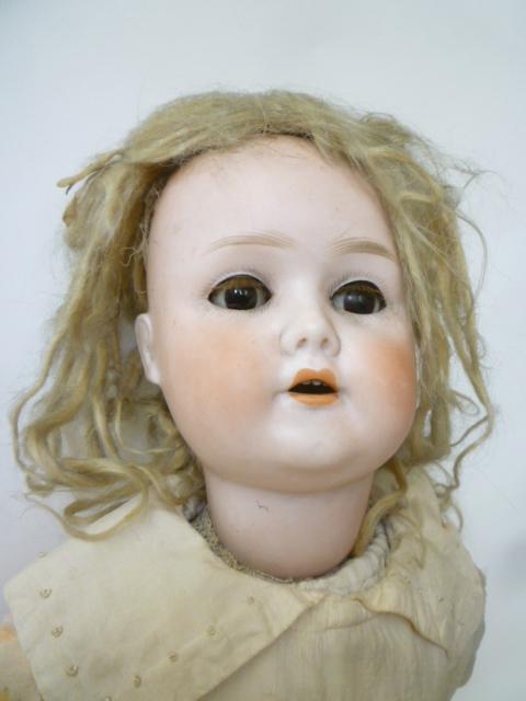 A Schoenhaur & Hoffmeister bisque head girl doll with brown glass sleeping eyes, open mouth and - Image 2 of 2