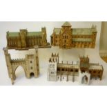 A quantity of painted wood and card lineside buildings including three cathedrals and a castle gate