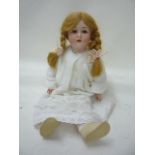 A Porcellanfabrik Mengersgereuth bisque head girl doll with blue glass sleeping eyes, open mouth and