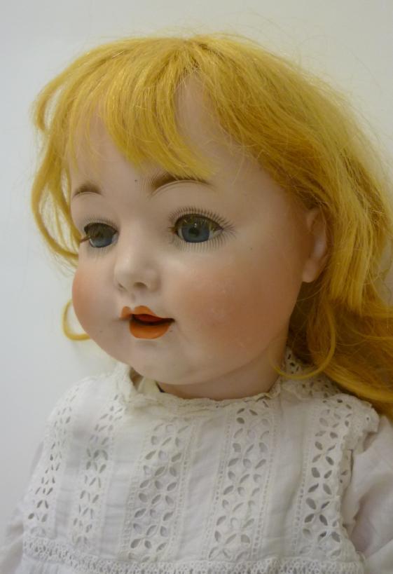 A German bisque head character doll, possibly Konig & Wernicke, with blue glass sleeping eyes, - Image 2 of 2