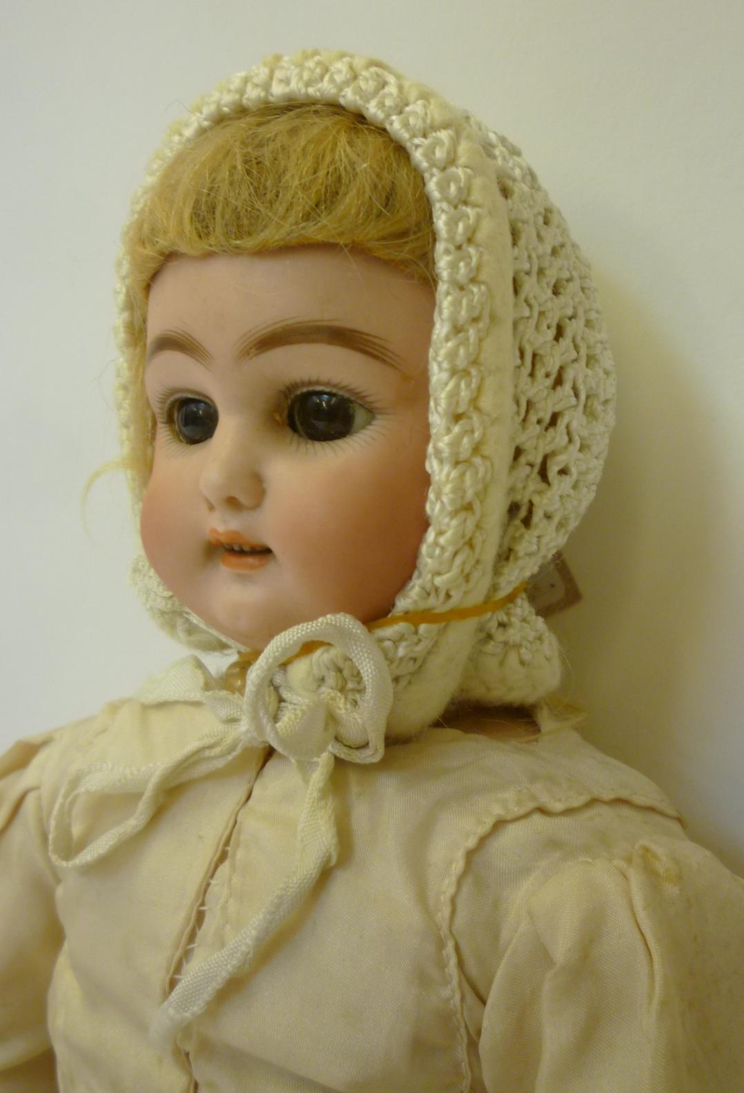 A Simon & Halbig bisque head girl doll with brown glass sleeping eyes, open mouth and teeth, pierced - Image 2 of 2