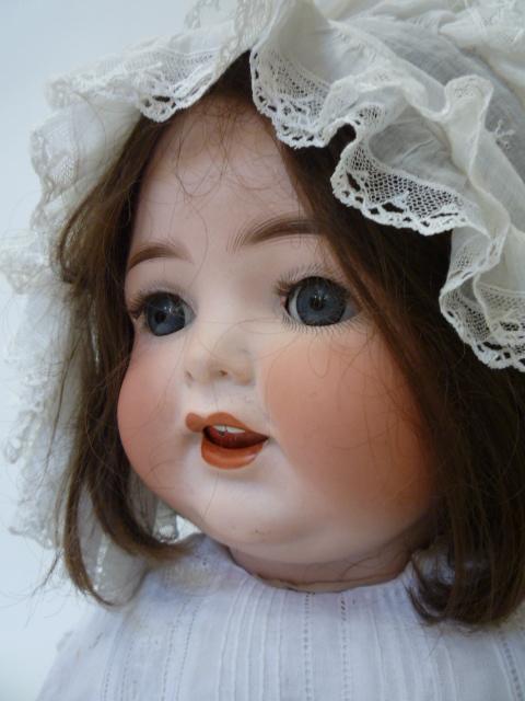 An Ernst Heubach bisque head girl character doll with blue glass sleeping eyes, open mouth and - Image 2 of 2