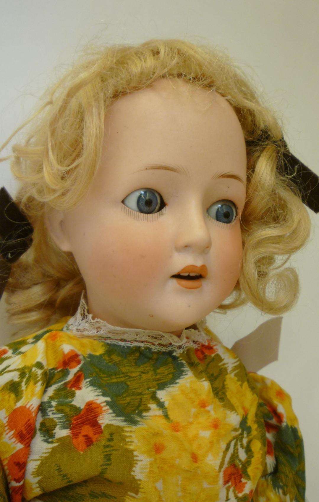 A German bisque "Revalo" type doll with blue glass sleeping eyes, open mouth and teeth, blonde - Image 2 of 2