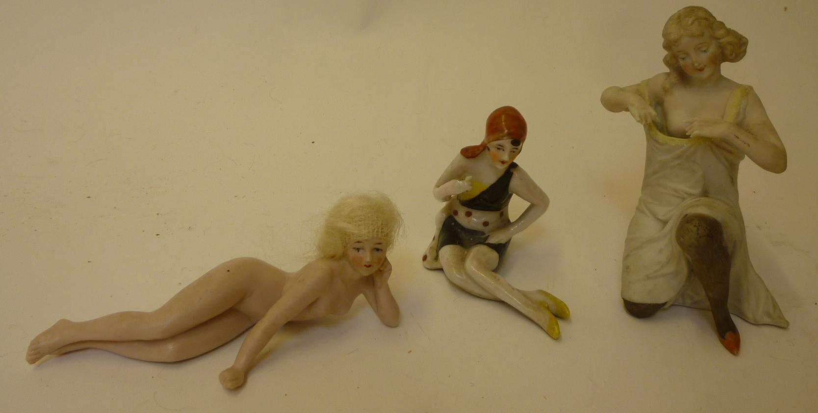 Three various German early 20th century bathing belles, one glazed, in swim suit, 2 1/2" high, a