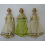 Three matching bisque shoulder head dolls house dolls with fixed brown glass eyes, coiffed blonde