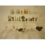 A collection of dolls house equipment comprising glass, pottery and metal table ware and other