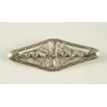 AN EDWARDIAN DIAMOND "SPIDER'S WEB" BROOCH, of lozenge form open back collet set with eleven small