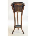 A CARVED GILT WOOD AND CANED JARDINIERE STAND, early 20th century, of circular tapering form